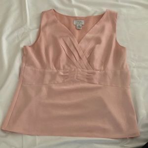 Ann Taylor Loft Shell w/pleats on chest and mid section. 100% polyester.